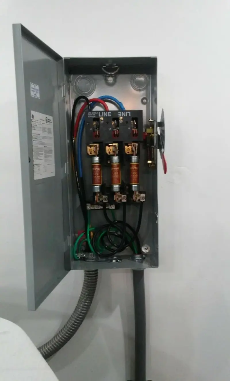 Three-phase disconnect switch installed for Smoke Detector Installation in New Brighton